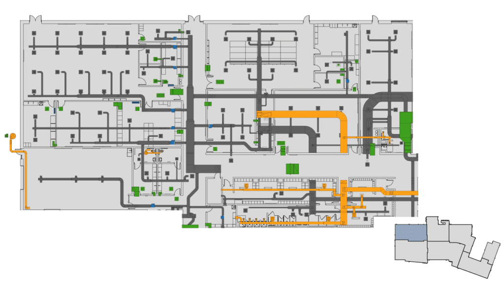 A floor plan map showing pathways and rooms, with colored lines and blocks indicating routes and features. An inset at the bottom-right highlights this section within a larger building layout.