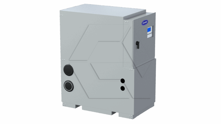 A gray, rectangular industrial HVAC unit with a small digital display and circular vents on the front, standing on a light background. The Carrier logo is visible near the top right corner.
