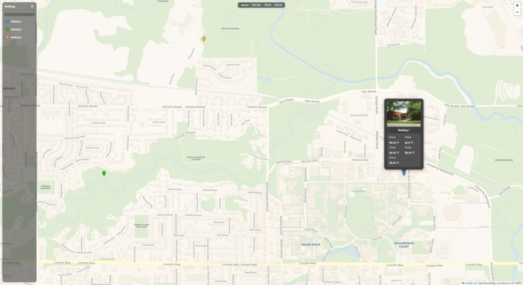 A digital map interface showing a suburban area with roads, parks, and rivers. Three colored markers are present, and a pop-up displays information about "Building J" with a small exterior photo. A sidebar menu is on the left.