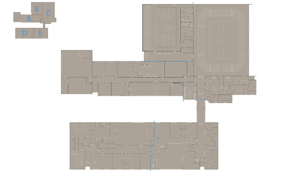 2D floor plan showing two main connected buildings, each with multiple rooms and hallways. At the top right, there is a gym and stadium with courts. Top left shows five labeled rooms: A, B, C, D, and E. Blue arrows indicate pathways.